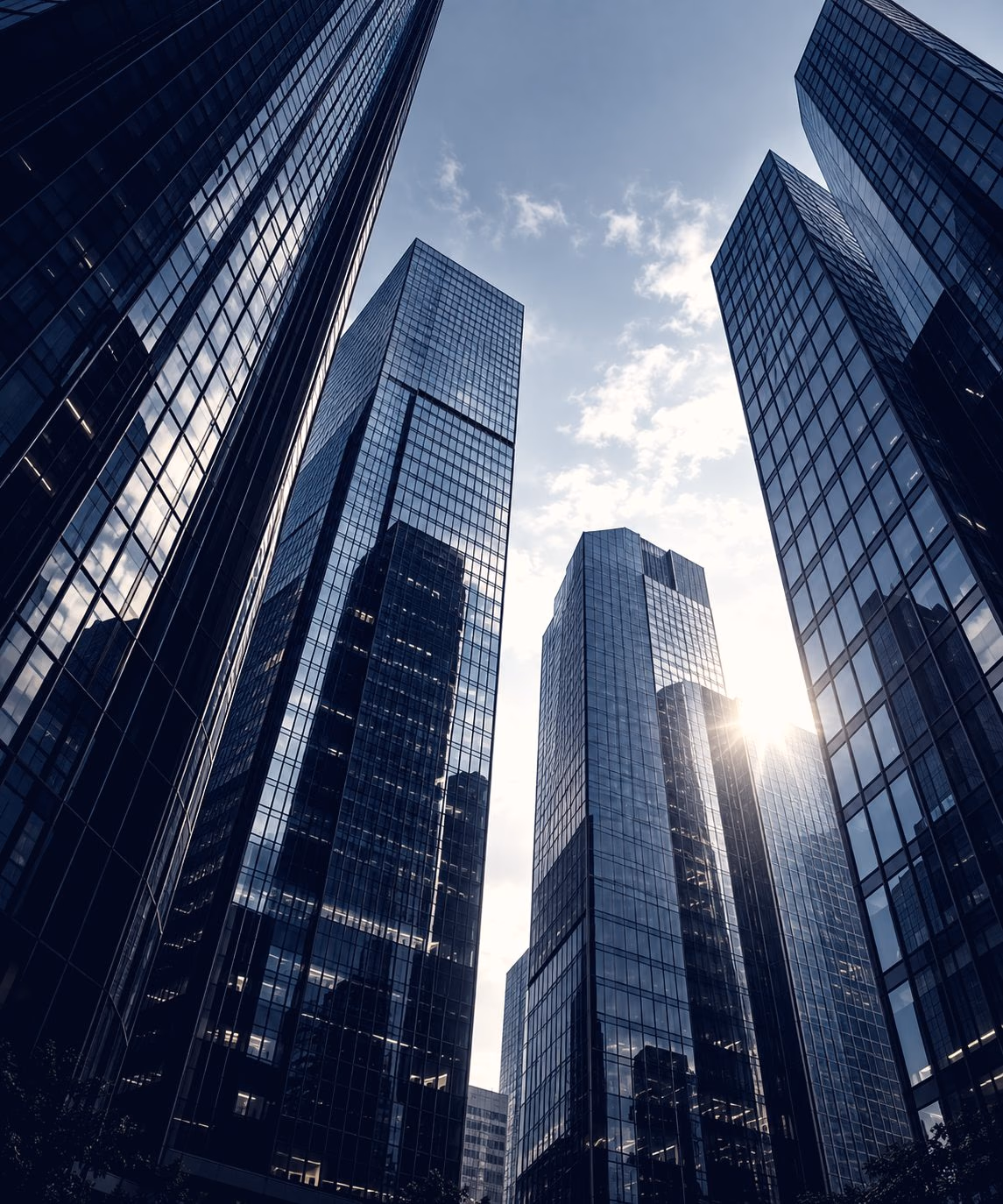 Glass office towers seen from below